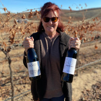 Cindi with wine bottles