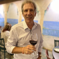 Leon with glass of wine